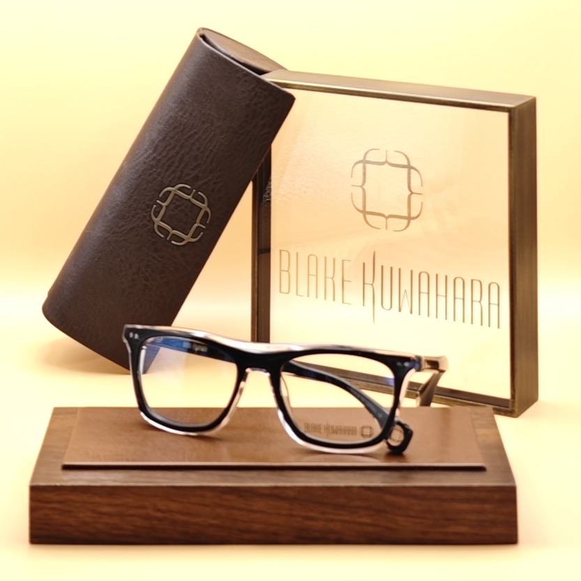 Blake Kuwahara's Cobb rectangular optical frames in a black browline over clear crystal lower rim acetate.