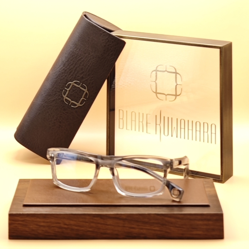 Blake Kuwahara's Albers classic rectangular optical frame in transparent light grey acetate.