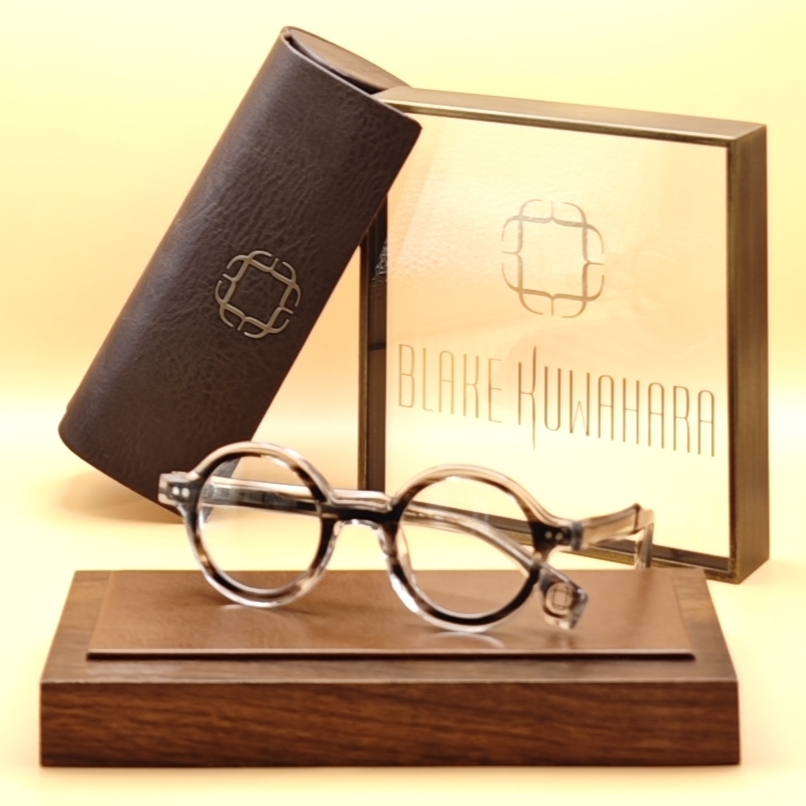 Blake Kuwahara's Pei perfectly round optical frames in a light grey and dark brown tortoiseshell acetate.