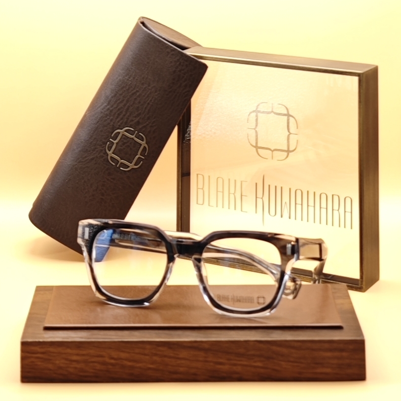 Blake Kuwahara's Kesling slightly rounded square optical frame with a layered acetate design in black and tortoiseshell over clear.