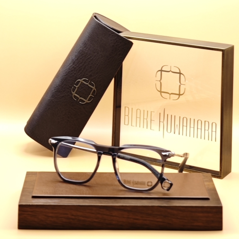 Blake Kuwahara's BK 1009 square-rectangle glasses in a sophisticated dark navy blue acetate with contrasting inner layer.