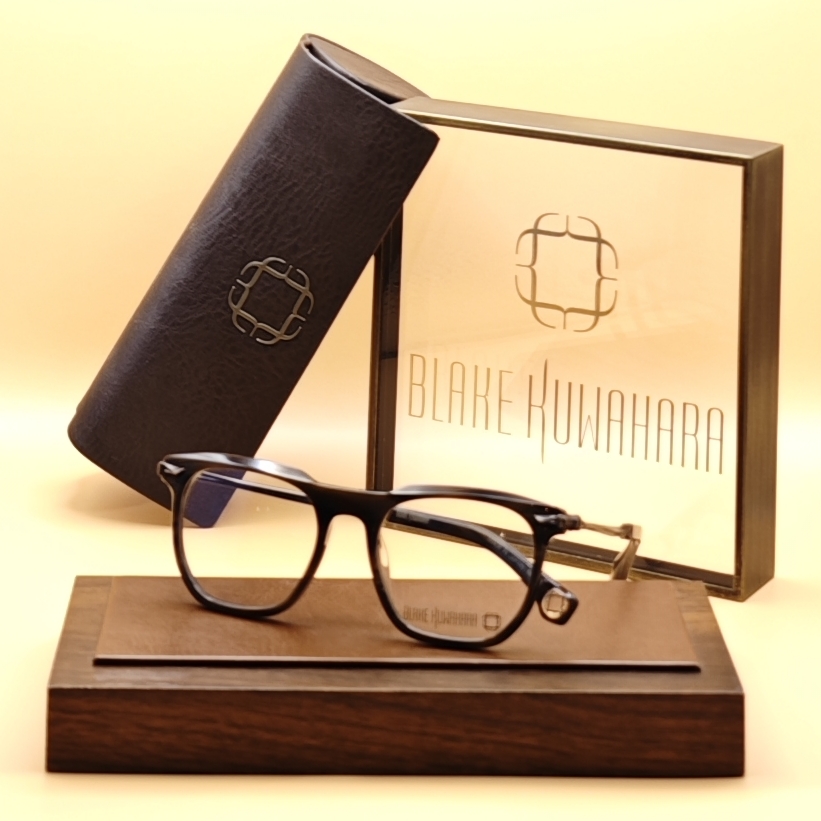 Blake Kuwahara's BK 1009 square-rectangle glasses in a sophisticated dark brown acetate with contrasting inner layer.