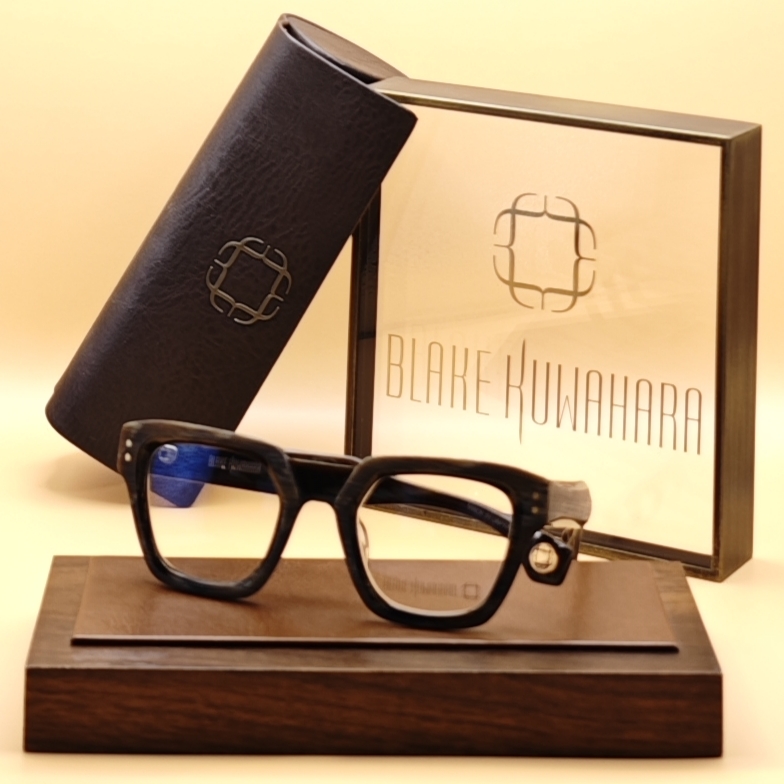 Classic, slim black BK 1027 Blake Kuwahara rectangular glasses with subtle metal detailing on the temples.